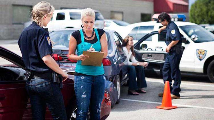 Woman filling out accident report